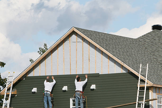 Professional Siding Repair technician working in Brielle, NJ
